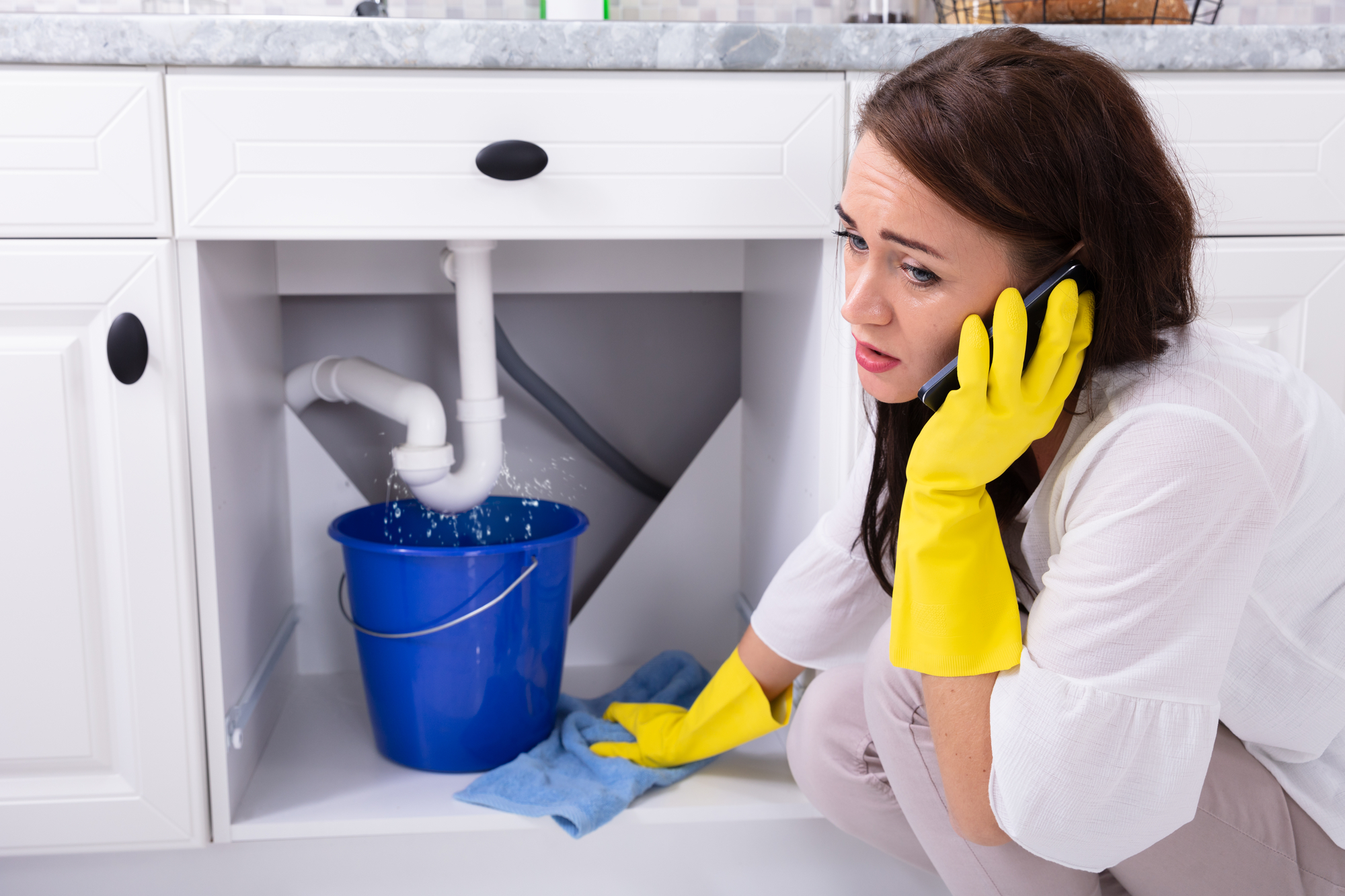 Calling Plumber, Water Leaking From Sink Pipe